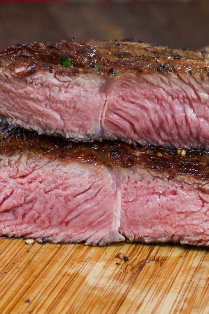 Once you have learned how to sous vide frozen steak, you’ll be amazed at how convenient and easy to cook or meal prep a delicious weeknight beef steak dinner! Cooking frozen steak is one of the best features of a sous vide machine. It’s perfectly tender, juicy and full of flavor. You’ll never take the time to thaw your steak again! #SousVideFrozenSteak