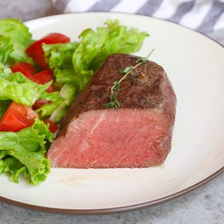 Sous vide steak is perfectly tender, juicy, and full of flavor. This recipe works well with most tender cuts like filet mignon (tenderloin steak), ribeye, sirloin, New York strip, porterhouse, or T-bone steak.