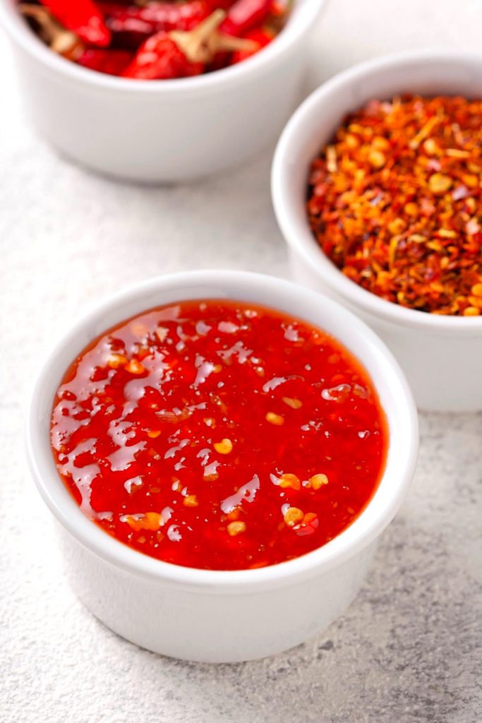 Sweet Thai Chili Sauce in a white bowl on the counter.