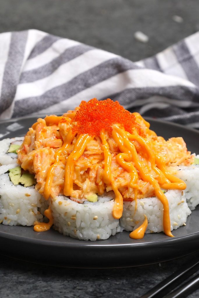 The Volcano Roll is highly addictive and will definitely blow your mind! It’s made with seafood, avocado, and cucumber rolled in seaweed sheet and sushi rice, with an incredibly delicious spicy lava topping. This recipe is easy to make and I’ll share with you the secrets on how to make a mouth-watering crab salad lava topping! #VolcanoRoll #VolcanoRollSushi