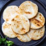 Homemade Arepa Paisa is so soft and fluffy – a delicious Colombian breakfast dish. It’s a popular flatbread made of corn, and can be served on its own or topped with eggs, cheese or meat!