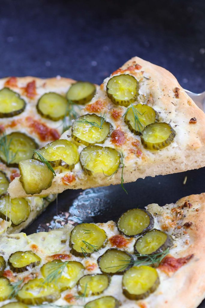 Freshly baked pickle pizza.