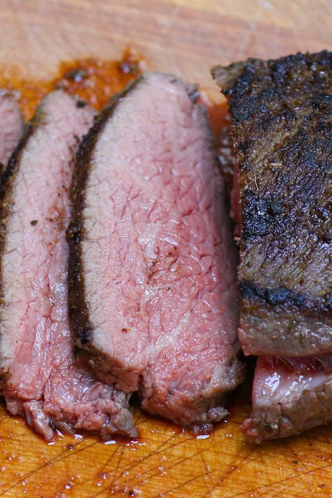 Santa Maria Style Sous Vide Tri Tip nails the edge-to-edge perfection on this triangle shaped bottom sirloin cut, resulting in amazingly juicy and tender steak. The tri-tip roast is cooked low and slow in a sous vide water bath, and then seared quickly in the skillet for a peppery, garlic-y brown crust. #SousVideTriTip #TriTipSouVide