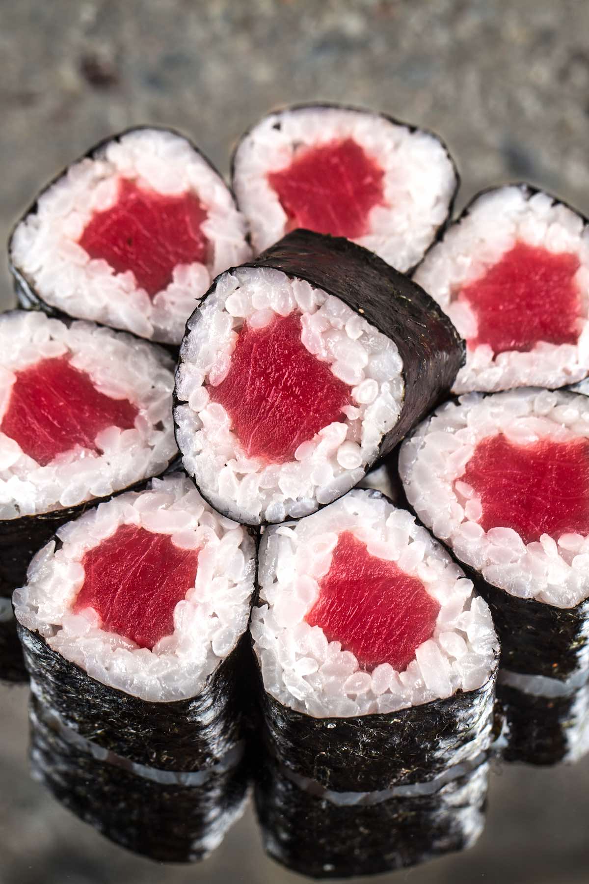 Tekkamaki Tuna Rolls are made with sashimi grade tuna rolled in vinegared sushi rice and nori seaweed sheet. Homemade Tekka Maki is so much cheaper than the restaurant, and it takes about 15 minutes from start to finish.#TekkaMaki #TunaRoll