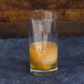 The Amber Moon is an American drink that has been around for a long time. Made with whiskey (or vodka), raw egg, and Tabasco, this cocktail used to be considered a “miner’s breakfast” in old days. Whether it’s an effective treatment for a hangover is controversial. #AmberMoon #AmberMoonCocktail