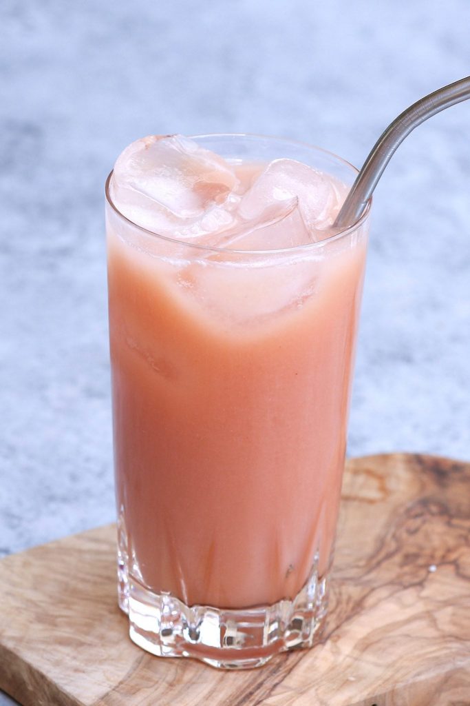 Iced Guava Passionfruit Drink is the new pink drink that has joined Starbucks’ permanent menu! Now you can make this tropical drink at home! This DIY copycat guava drink recipe has the perfect blend of guava, pineapple and coconut flavor. It’s a dairy-free refreshing fruity beverage that takes less than 5 minutes to make. #IcedGuavaPassionfruitDrinkStarbucks #GuavaDrinkStarbucks