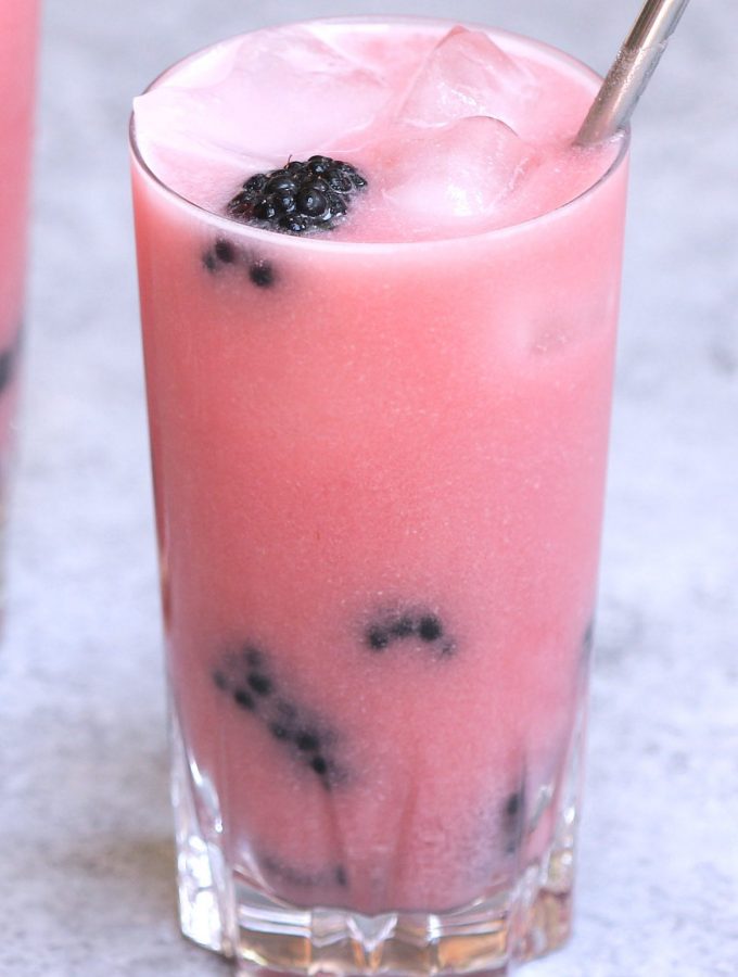 Make the refreshing Starbucks Violet Drink at home! This copycat recipe is a real deal with stunning purple color and delicious flavor at the fraction of the price. A perfect dairy-free iced beverage made with sweet blackberries, hibiscus tea, and coconut milk. #VioletDrink #StarbucksVioletDrink #VioletDrinkRecipe