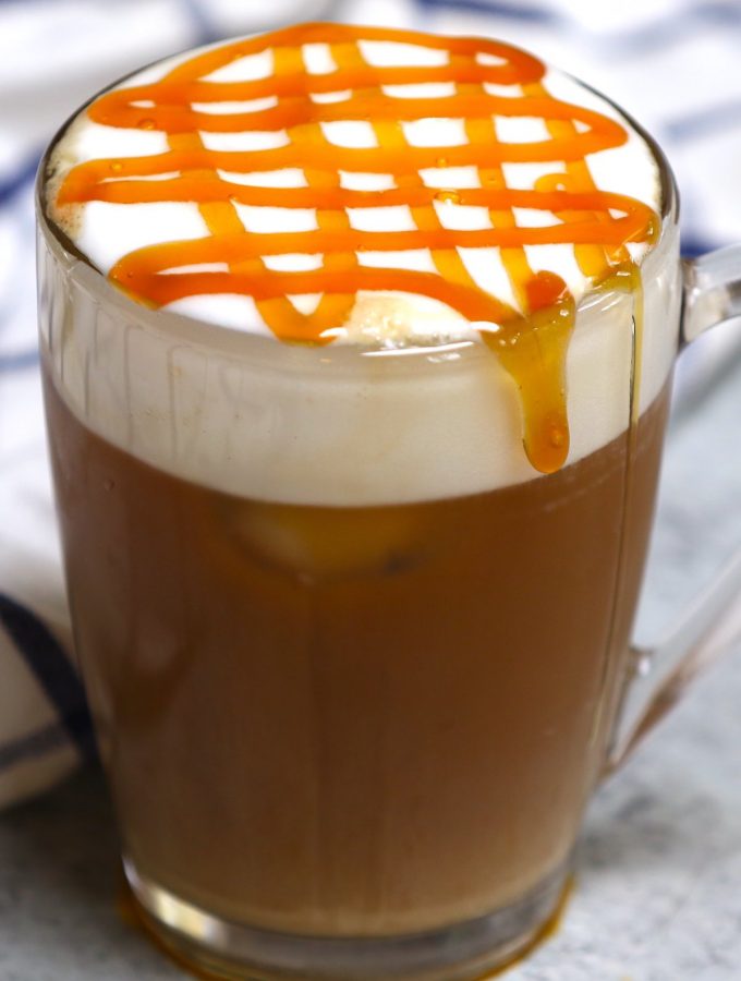 Try this copycat recipe of the popular Starbucks drink – Caramel Could Macchiato! Airy, foamy, full of delicious espresso and vanilla flavor, then topped with buttery caramel sauce. This Starbucks cloud macchiato recipe is not to be missed! #IcedCloudMacchiato #CloudMacchiato #CaramelCloudMacchiato