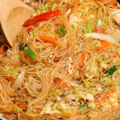 This amazing Pad Woon Sen recipe is surprisingly easy to make at home in under 30 minutes. It’s a Thai stir fried noodle dish made with glass noodles, proteins, veggies tossed in a savory and slightly sweet pad woon sen sauce. It tastes like it came from your favorite Thai restaurant. #PadWoonSen #PadWoonSenRecipe #PadThaiWoonSen