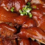 Braised Pig’s Feet are tender, juicy, and flavorful – cooked long and slow in a rich sauce. Pig feet or pig trotters are considered one of the most delicious parts of pork. My family make this recipe for regular weekdays and special occasions like Chinese New Year. Serve them with mashed potatoes and green vegetables for an amazing meal! #PigFeet #PigFeetRecipe #PigTrotters #PorkFeet