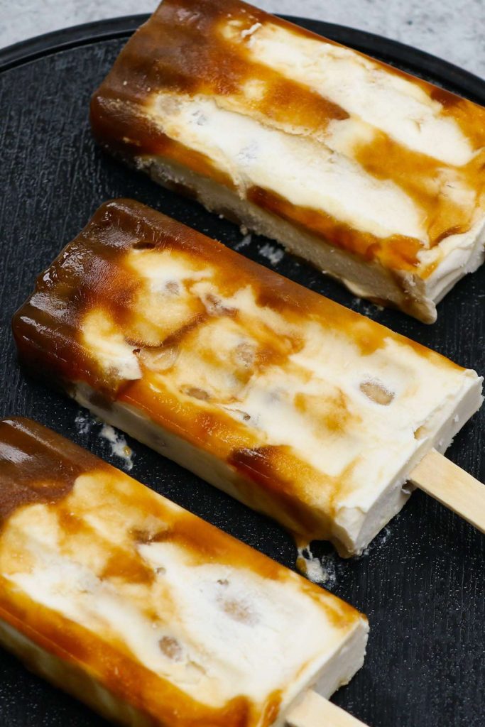 Ever tried Brown Sugar Boba Ice Cream Bars? This Asian frozen dessert has been a viral sensation around the world recently. It has a delicious combination of sweet, creamy ice cream and soft, chewy bubble tea pearls. Here is an easy recipe showing you how to make this special treat at home, rivaling the popular Shao Mei Boba popsicles. #BobaIceCream #BobaIceCreamBar #BrownSugarBobaIceCream