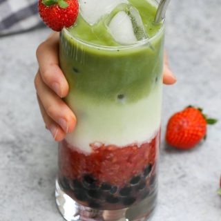 Ever wondered how to make Boba Guys’ insta-worthy layered Strawberry Matcha Latte? Here is an easy and simple bubble tea strawberry matcha latte recipe that shows how to make this creamy iced drink at home! It’s creamy, refreshing, and loaded with soft and chewy boba milk tea pearls.