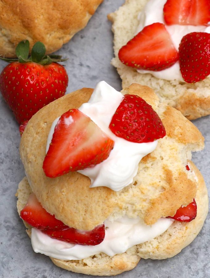 The easiest Bisquick Strawberry Shortcake made with original Bisquick pancake mix! Featuring fluffy Bisquick shortcakes layered with delicious strawberries and fresh whipped cream, these light and sweet biscuits are made with a few simple ingredients. A perfect summer dessert that’s sure to please everyone! #BisquickStrawberryShortCake #BisquickShortcake