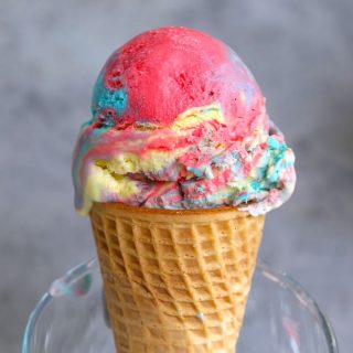 Looking for a fun way to cool down on a hot day? Look no further than Superman Ice Cream – Michigan’s favorite ice cream flavor! Our homemade vanilla superman ice cream comes as a swirl of 3 colors: blue, red, and yellow, just like the colors of Superman’s costume. This easy recipe will have you indulging in a sweet rainbow scoop in very little time.