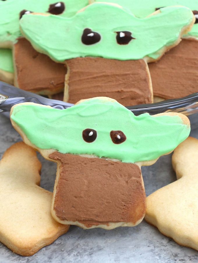 These Baby Yoda Cookies have crisp edges, soft centers, and are decorated with royal icing. With a simple hack of using a Christmas angel cookie cutter, these adorable sugar cookies are easy to make and look just like the Mandalorian creature when finished. It’s all over social media, and popular among Star War fans.