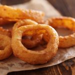 These copycat Burger King Onion Rings are crispy and bursting with savory onion flavors! Made with a few simple ingredients, these homemade onion rings are a perfect side dish, appetizer, or snack for any occasion. Pair them with the onion ring sauce – mouth-watering delicious.