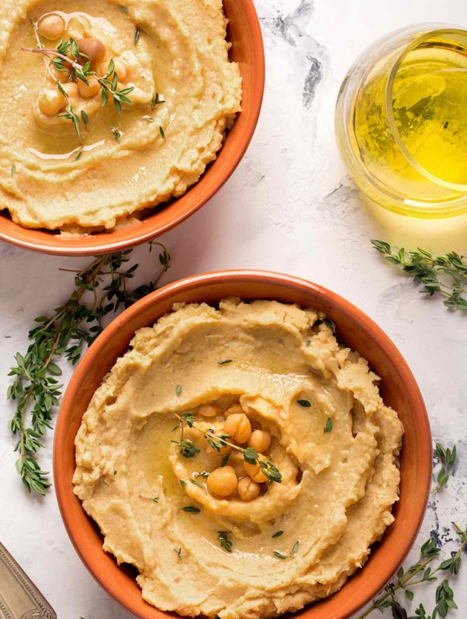 Hummus is a smooth, creamy, and flavorful savory spread made with puréed chickpeas. You can buy it from the grocery stores, order it at Middle Eastern/Mediterranean restaurants, or make it at home by stirring in tahini, lemon juice and spices.