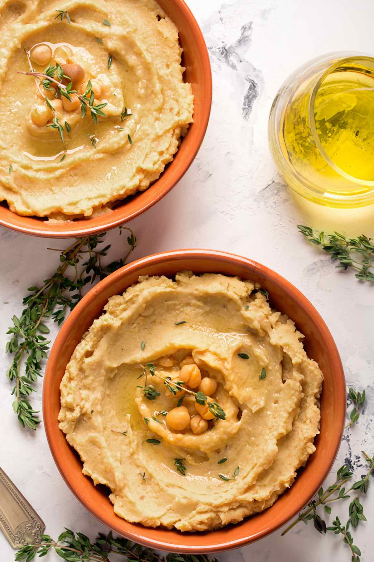 Hummus is a smooth, creamy, and flavorful savory spread made with puréed chickpeas. You can buy it from the grocery stores, order it at Middle Eastern/Mediterranean restaurants, or make it at home by stirring in tahini, lemon juice and spices.