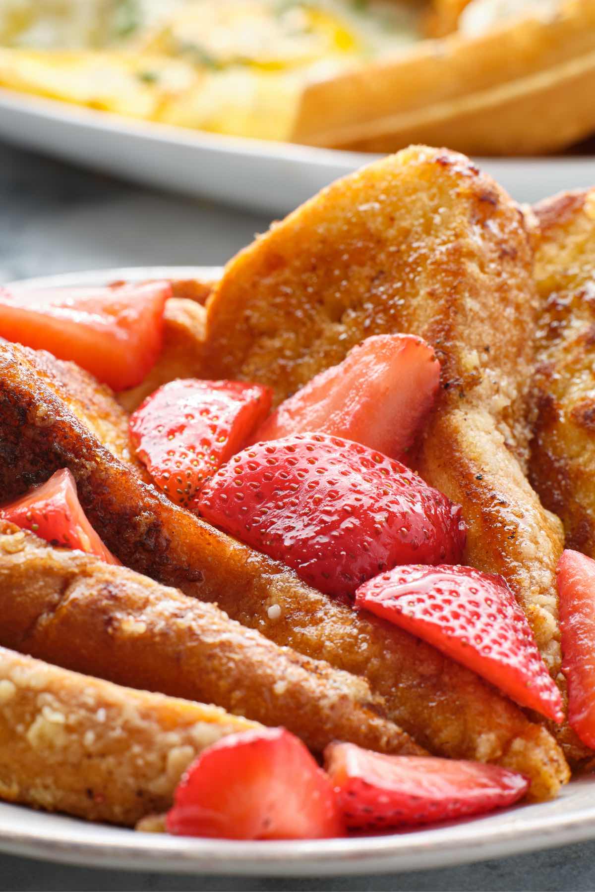 The sweet and buttery IHOP French Toast is super easy to make and perfect for weekend breakfast! The balanced flavors are soaked into brioche bread, with a hint of cinnamon and vanilla. Serve with strawberries or bananas, and this is the recipe your whole family will go crazy for. 