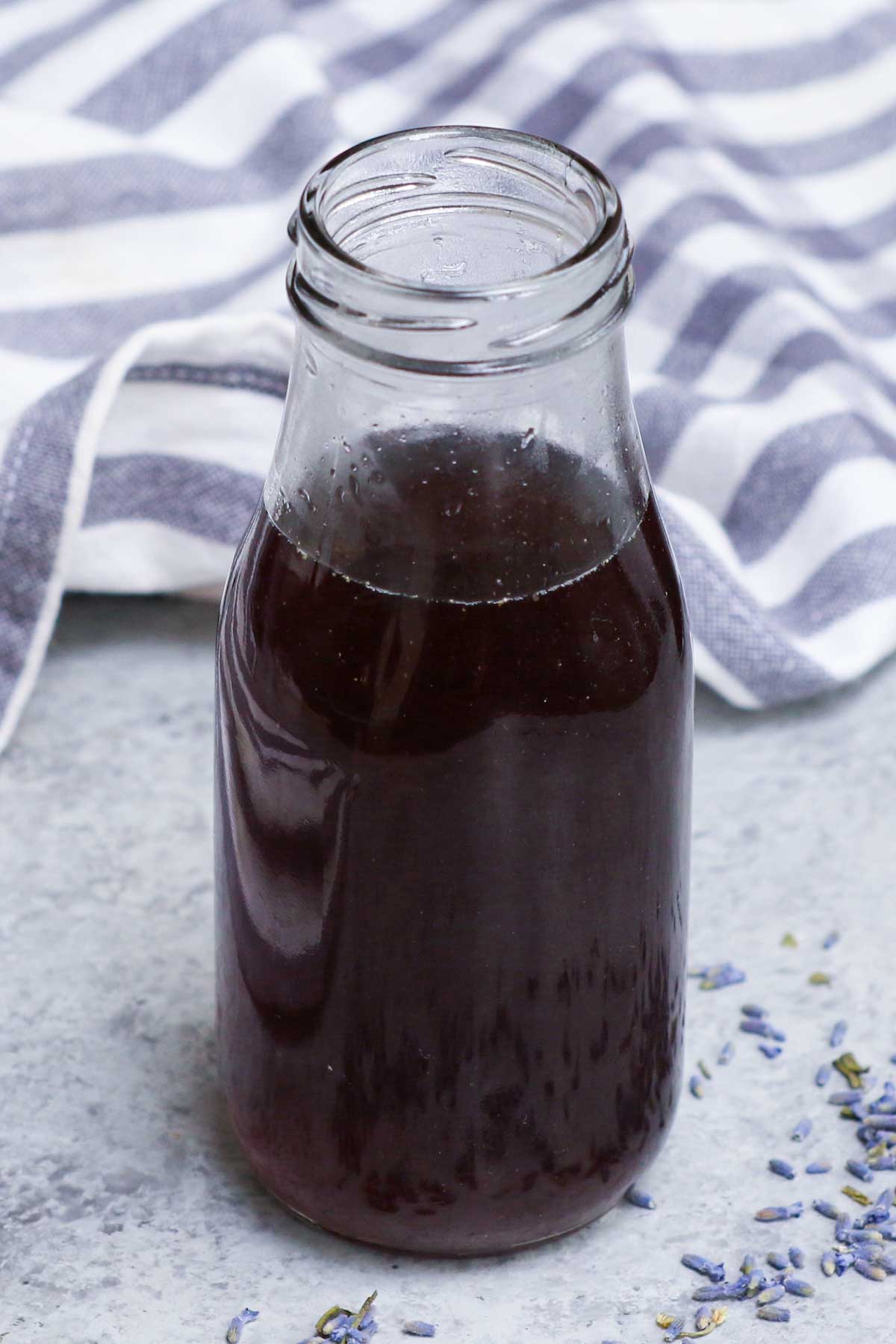 Lavender Simple Syrup is a great way to add sweetness to your drinks while bringing in bright, floral notes. The name itself says how easy this lavender syrup recipe is to make. All you need is lavender, sweetener and water to make an herb-infused syrup that can transform your cocktails, or add elegance to classic beverages like coffee, tea or lemonade.