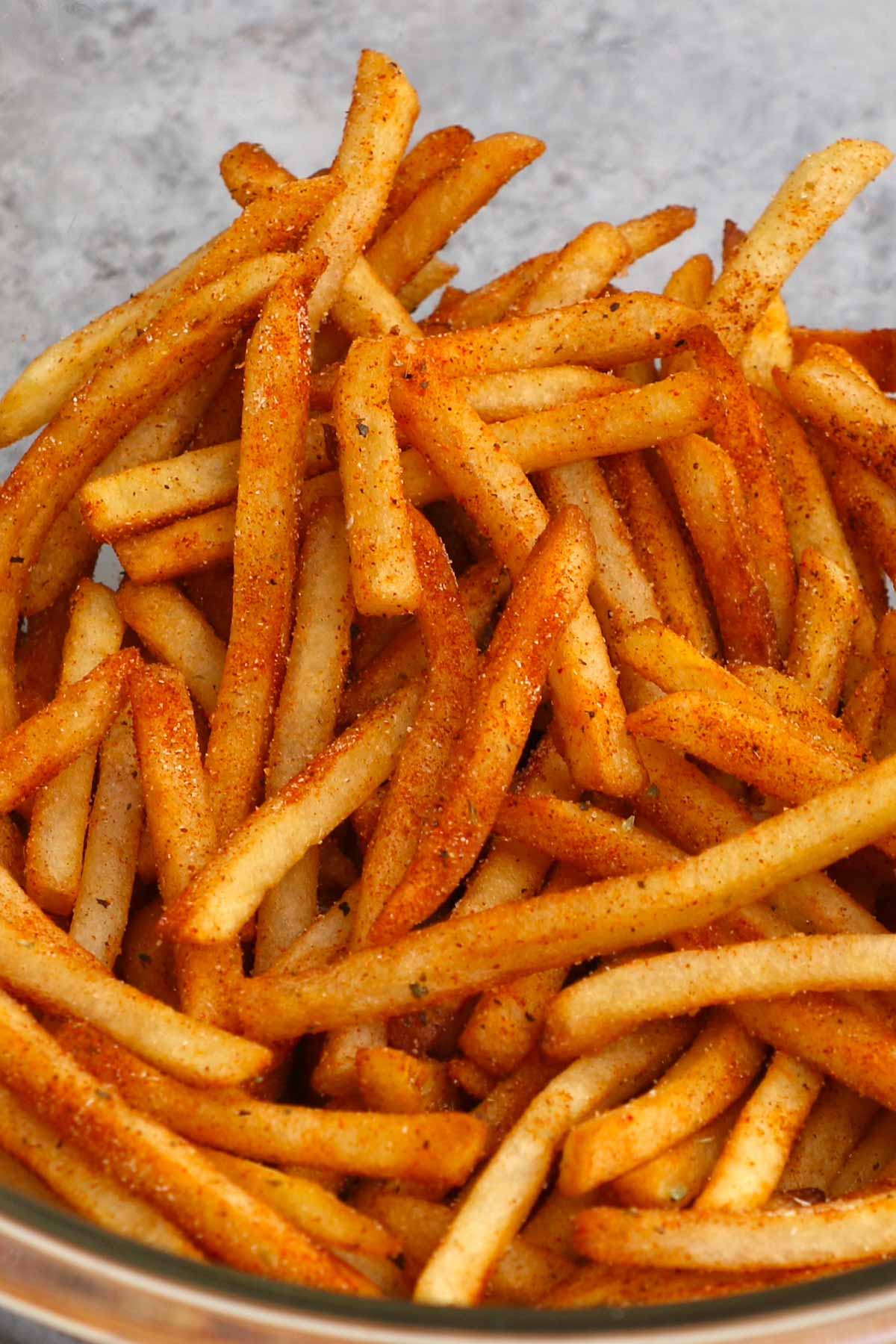 These homemade copycat Popeyes’ Cajun Fries are crispy on the outside, fluffy on the inside, with the perfect kick. They taste the same if not better than the fast-food French fry. What distinguishes these Popeyes Fries is an irresistible mix of seasonings for an authentic Cajun treat.
