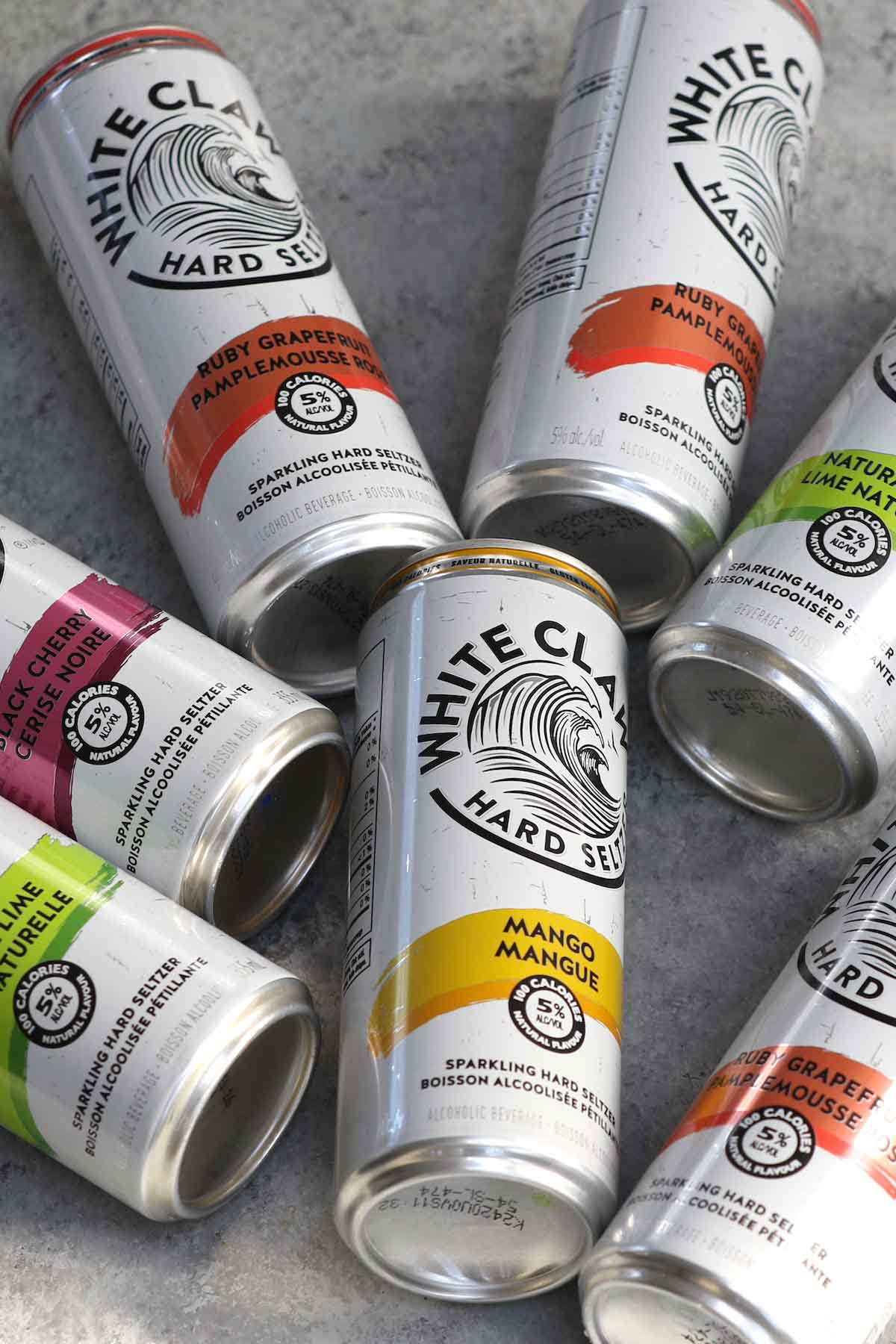 With the combination of seltzer water, a hint of fruit, and a dash of alcohol, White Claw is the perfect refreshing boozy beverage that we all love! After White Claw introduced Tangerine, Watermelon and Lemon in March 2020, strawberry, pineapple, and blackberry will join the White Claw Hard Seltzer Flavors in the new variety pack. Which flavor is best? Our favorites are still mango and black cherry. 