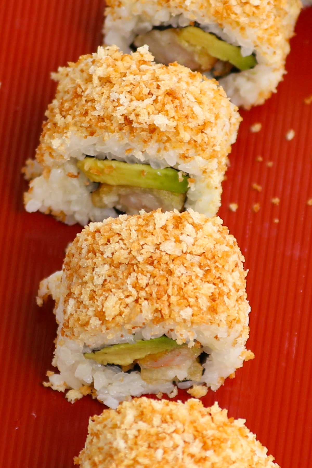 Crunchy Roll Sushi is a delicious variation of the popular California Roll. This crunchy roll features shrimp tempura filling and a crispy topping of toasted panko breadcrumbs. The flavor and texture are out of this world! This recipe is easy to make at home, rivaling the one from your favorite Japanese restaurant.