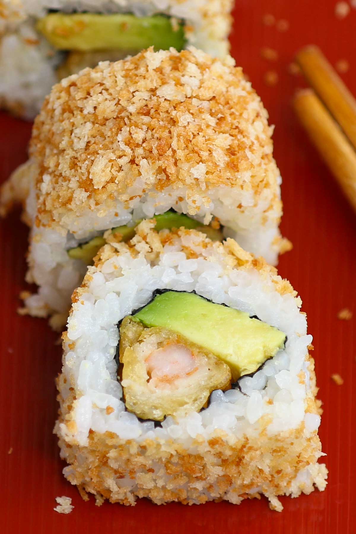 Crunchy Roll Sushi is a delicious variation of the popular California Roll. This crunchy roll features shrimp tempura filling and a crispy topping of toasted panko breadcrumbs. The flavor and texture are out of this world! This recipe is easy to make at home, rivaling the one from your favorite Japanese restaurant.