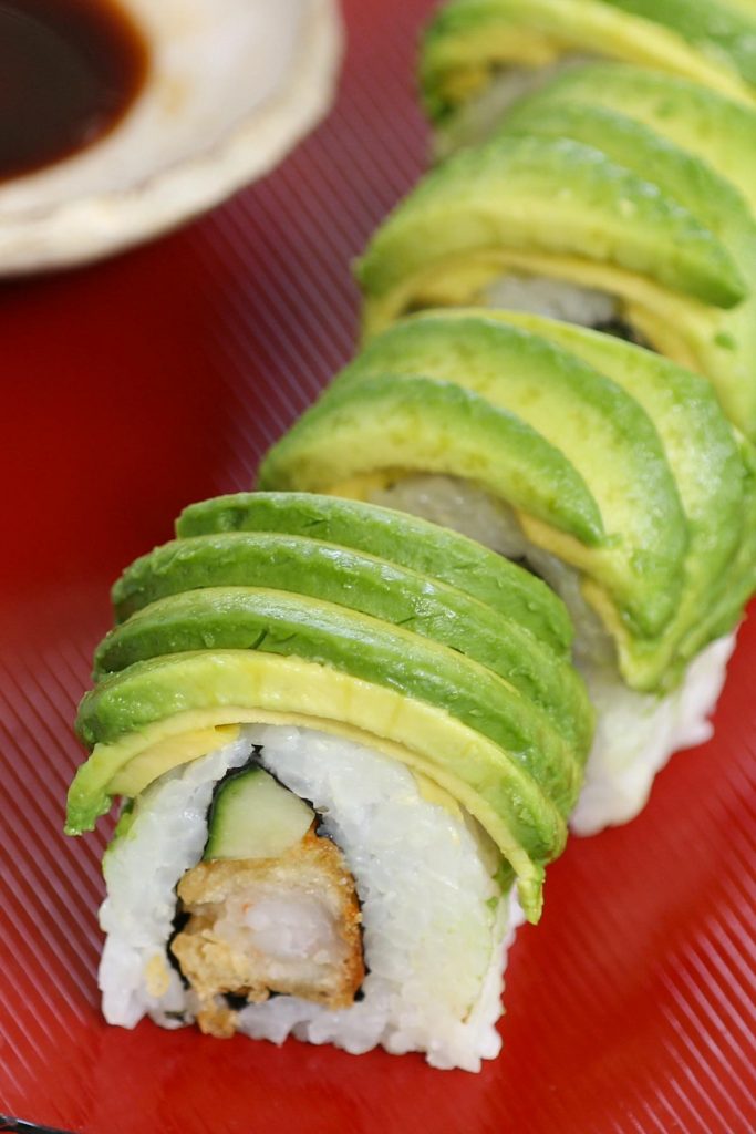 The Dragon Roll is one of the best sushi of all time at Japanese restaurants. Filled with tempura shrimp and cucumber, dragon roll sushi has a delicious buttery topping, resembling dragon scales. We will share all the tips and tricks so you can easily do them at home!