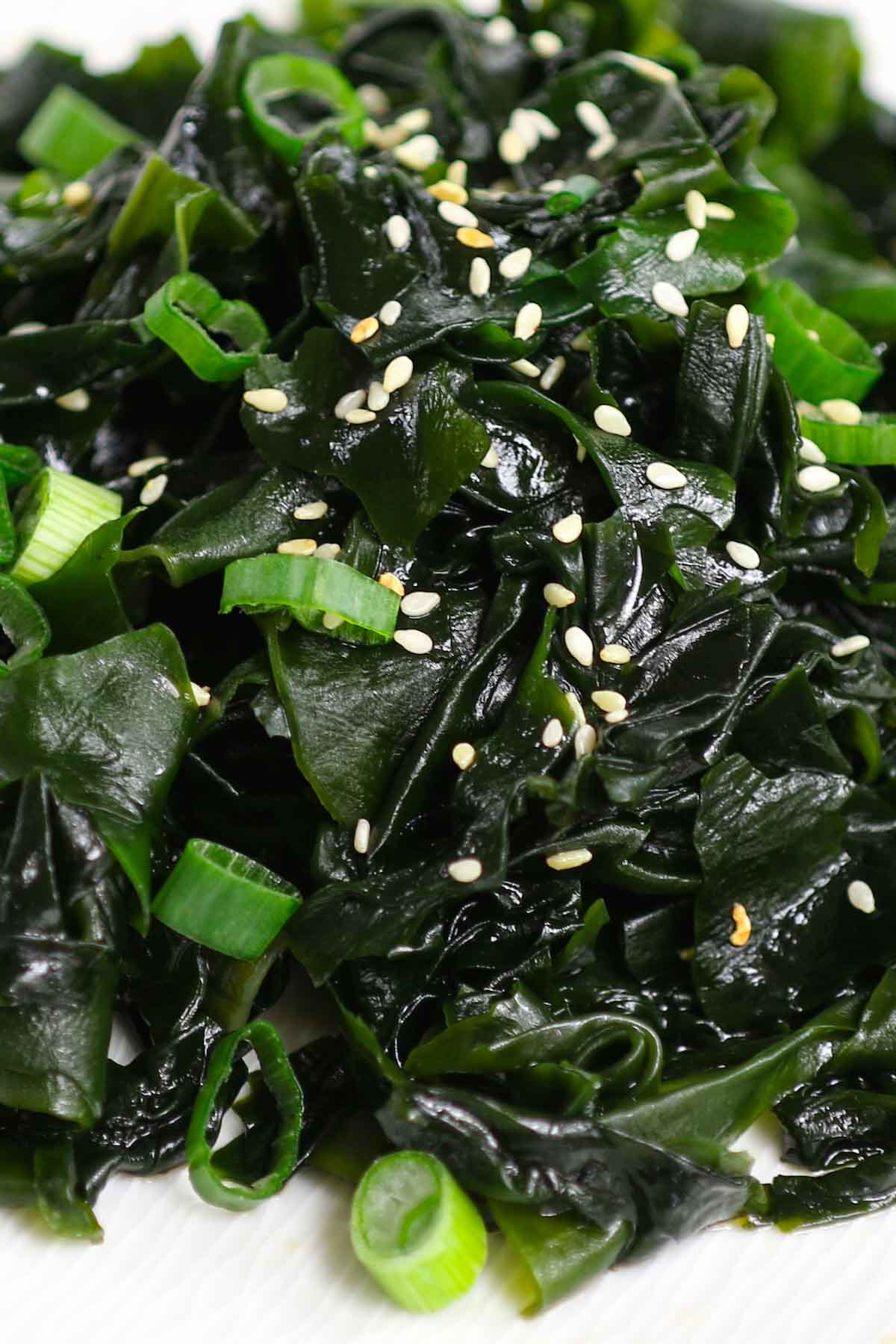 This healthy Seaweed Salad is refreshing, delicious, and super easy to prepare. Made of dried wakame, sesame seeds, and a simple dressing, this Japanese salad recipe is made from scratch and loaded with great nutrients. Serve with cherry tomatoes and green leafy vegetables for a low-carb lunch or dinner!