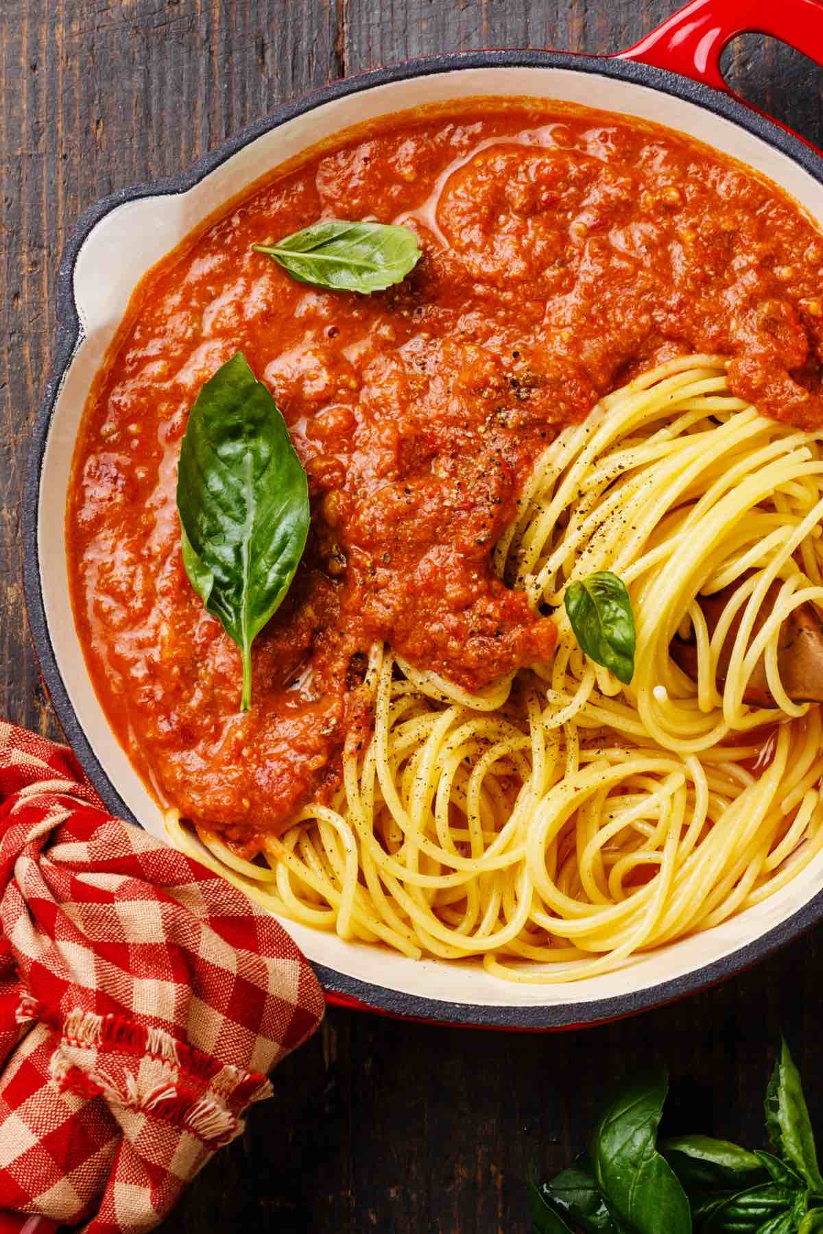 Learn How to Thicken Spaghetti Sauce like a pro! If you find yourself with a watery pasta sauce, you don't need to toss it out and start over again. There are a few quick and simple ways you can reduce your homemade Italian sauce to save it.