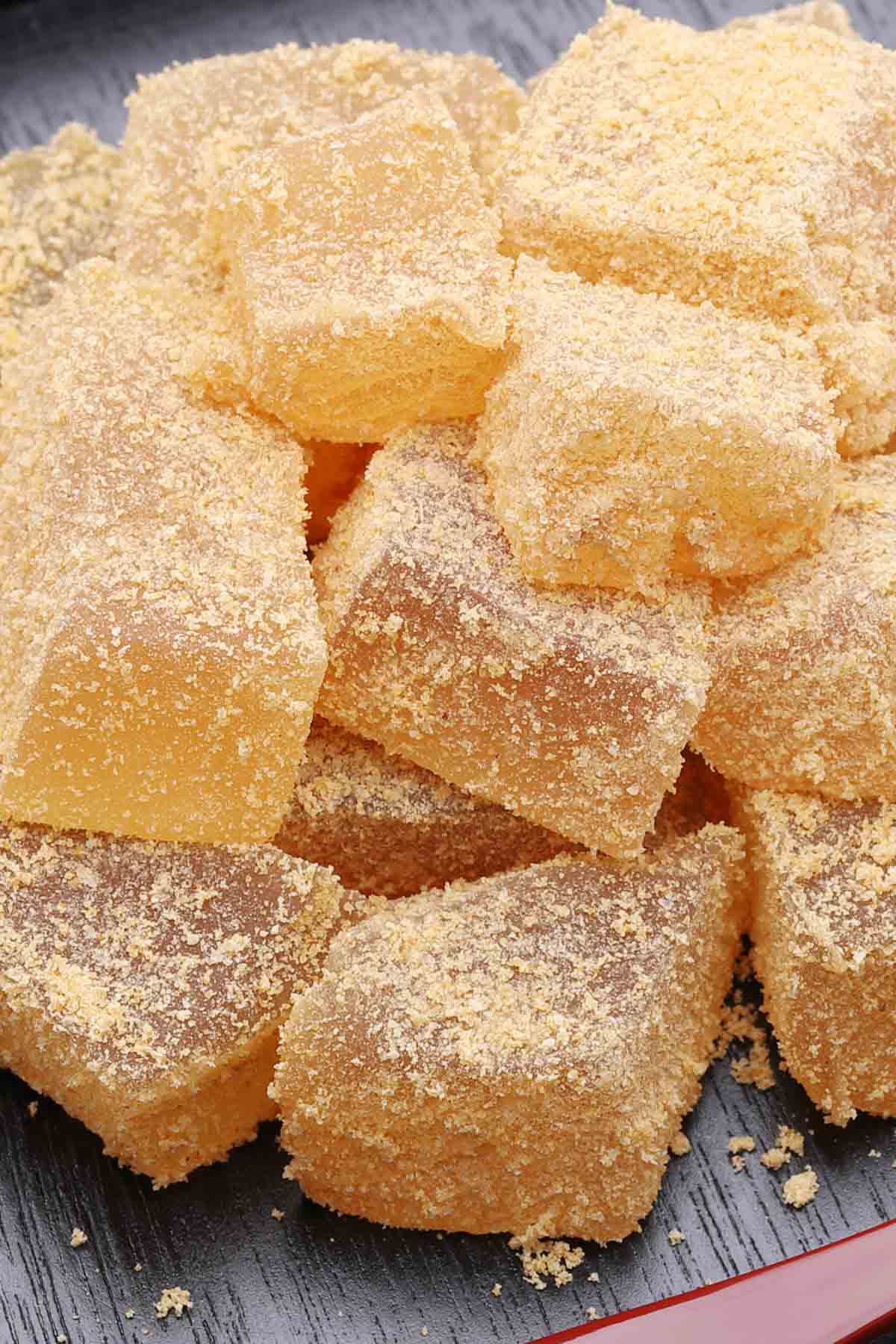 Looking for a fun and refreshing summertime treat recipe? This chilled Japanese dessert is exactly what you need. Warabi Mochi is a soft, chewy, and jelly-like confection that you can make with just a few ingredients. It’s made with warabiko, different from the mochi made with glutinous flour, but gets its name from the similarity in texture. Warabimochi is often dipped in kinako soybean powder, with an amazing nutty flavor!