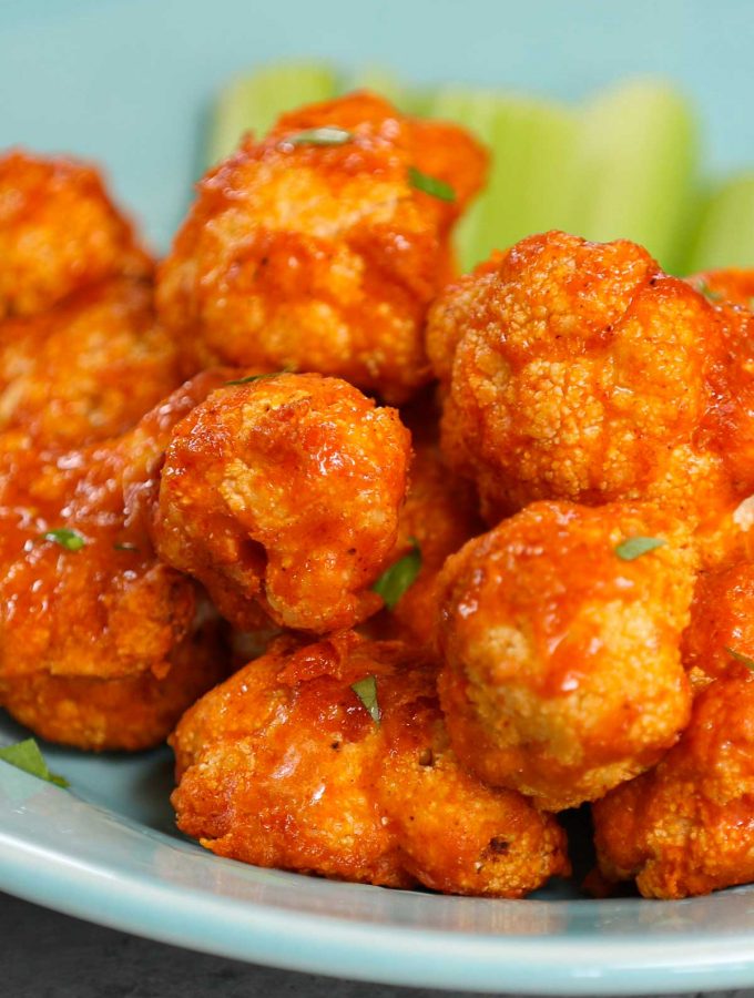 Air Fryer Buffalo Cauliflower is a healthy and low-carb appetizer, snack, or side dish made with NO OIL! These spicy vegan cauliflower bites don’t taste like Buffalo wings, but they’re definitely healthier with an even better flavor. This is a really easy recipe and takes less than 20 minutes in the air fryer.