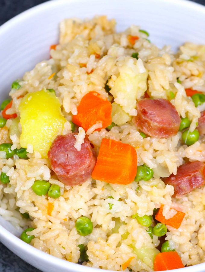 Chinese Rice Cooker Fried Rice is my absolute favorite. This no-fuss “dump and go” rice cooker recipe is made with a few simple ingredients with less than 5 minutes of prep! It’s so easy to make, customizable with any of your favorite mix-ins, and it’s incredibly delicious.