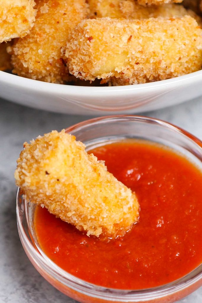 Olive Garden is known for its delectable Italian menu items, including appetizers. For those who want to go beyond breadsticks, this copycat Stuffed Ziti Fritta is crispy, cheesy and packed with flavors. Cooked rigatoni pasta is stuffed with a delicious cheese mixture and then fried to golden perfection!