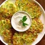 Zucchini Fritters are one of the best zucchini recipes that are easy to make at home. They’re crispy and full of flavor!
