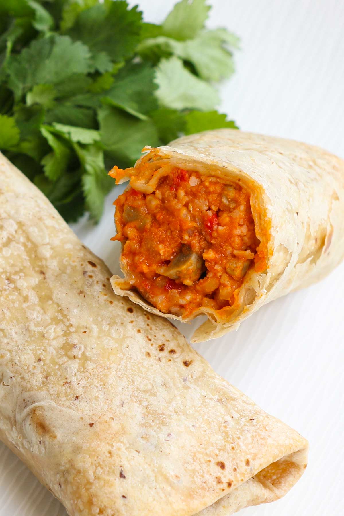 Cooking Frozen Burritos in Air Fryer is the easiest way to prepare a perfect lunch, dinner, or even breakfast. These air fryer frozen burritos are soft and flavorful on the inside and crispy on the outside. You can use this method to cook chimichanga too! Keep some frozen burritos in the freezer and you can satisfy your Mexican food cravings at any time!