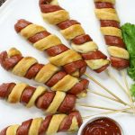 Crescent Roll Hot Dogs are one of the most popular ways to use Pillsbury crescent rolls. Made with 3 simple ingredients, these hot dogs are perfect for parties and game day.
