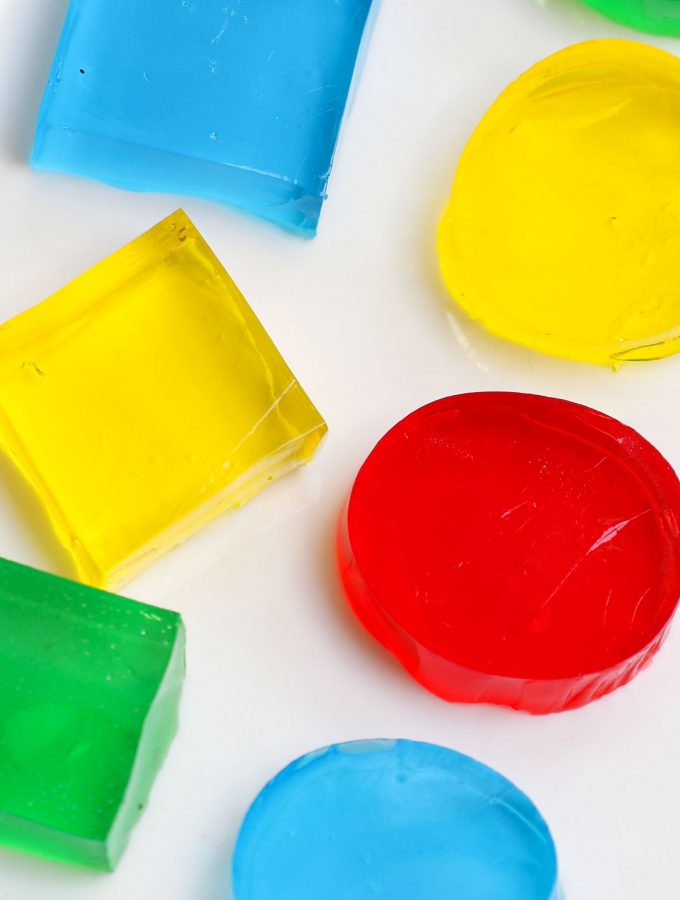 Jello Jigglers are fun, fruity, and colorful! It couldn’t be easier to make these kid-friendly jiggly snacks with just 3 simple ingredients and cookie cutters. I’ll share with you the tricks to get them perfect EVERY TIME. There are also many ways to customize this recipe: making it sugar-free, with alcohol, apple juice, or layered jello jigglers.