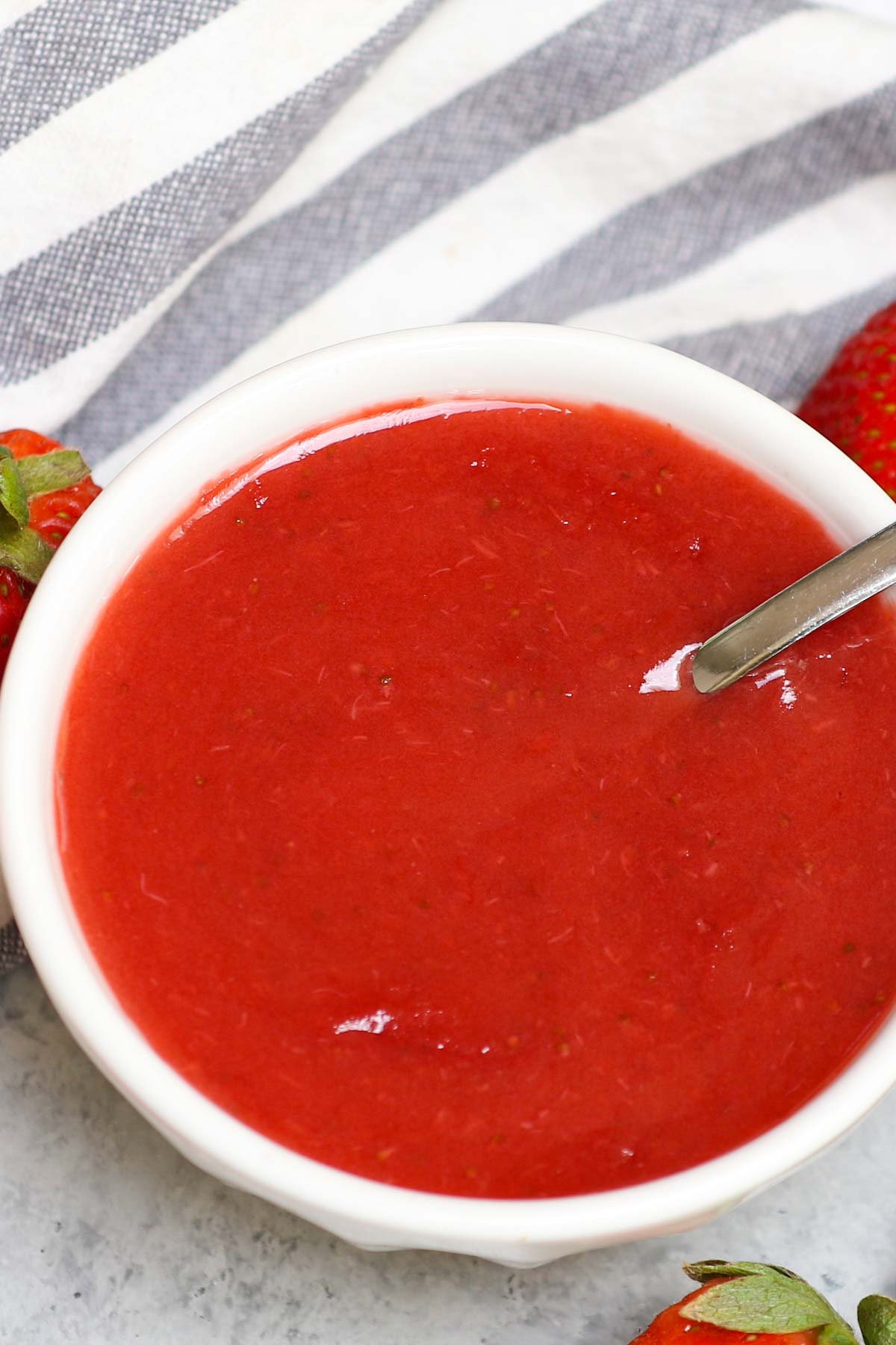 Whether you’re baking a pie, cheesecake, or homemade donuts, there’s nothing quite like a tasty Strawberry Glaze to add a sweet finishing touch. This strawberry sauce is made from scratch with real, juicy strawberries