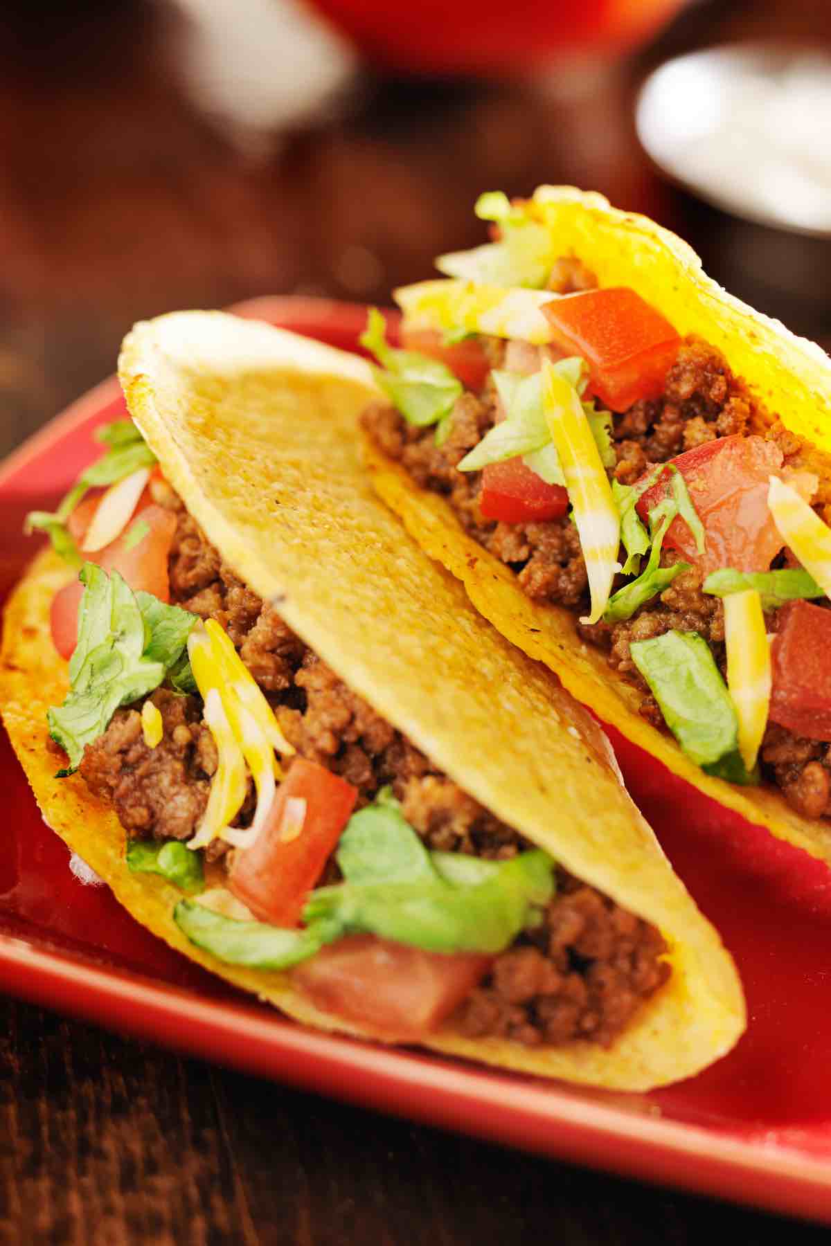 Tacos are one of the most popular Mexican foods. Great Taco Toppings will take your love for tacos to a new level! Great for Cinco De Mayo or Taco Tuesday! We've collected the best taco topping ideas from basic options like guacamole and shredded cheese to chicken, fish, and pork, including ones that are gluten-free and keto-friendly!