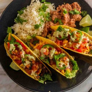 Tacos are one of the most popular Mexican foods. Great Taco Toppings will take your love for tacos to a new level! Great for Cinco De Mayo or Taco Tuesday! We've collected the best taco topping ideas from basic options like guacamole and shredded cheese to chicken, fish, and pork, including ones that are gluten-free and keto-friendly!