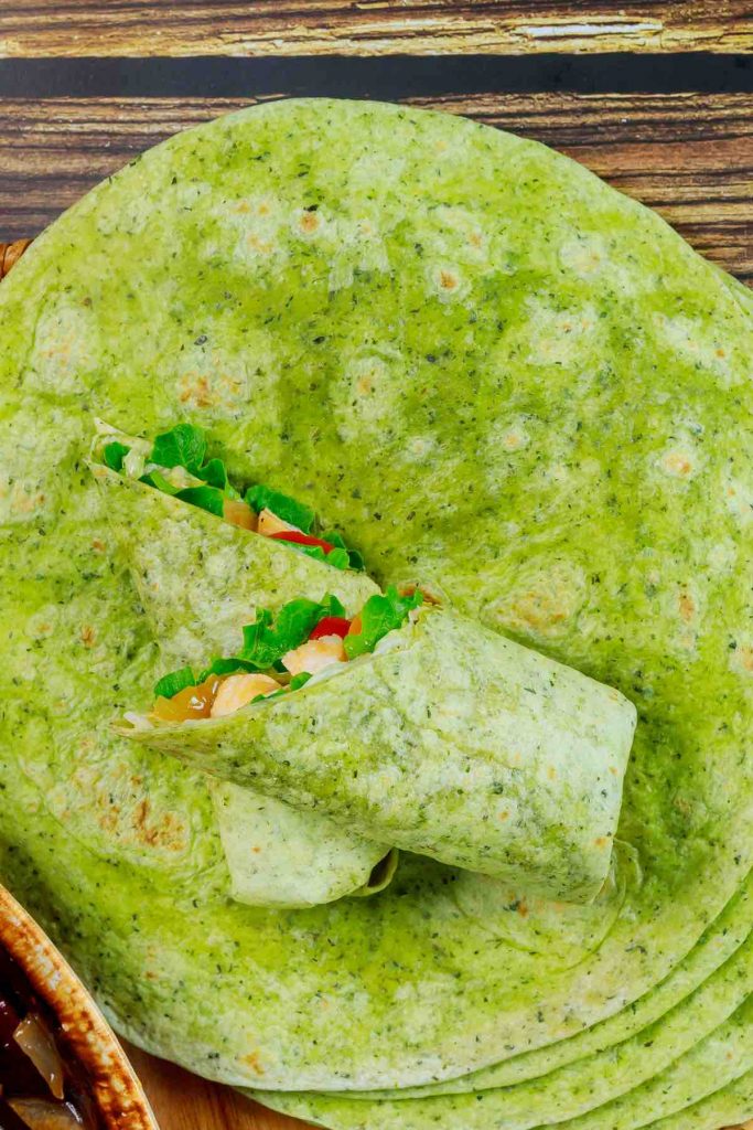 Healthy Spinach Wraps are super easy to make, and perfect for enchiladas, tacos, burritos, and quesadillas. These homemade spinach tortillas are better than the store-bought garden spinach tortilla wraps.