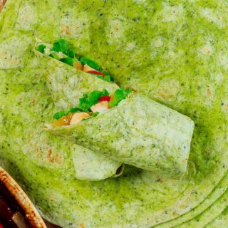 Healthy Spinach Wraps are super easy to make, and perfect for enchiladas, tacos, burritos, and quesadillas. These homemade spinach tortillas are better than the store-bought garden spinach tortilla wraps.