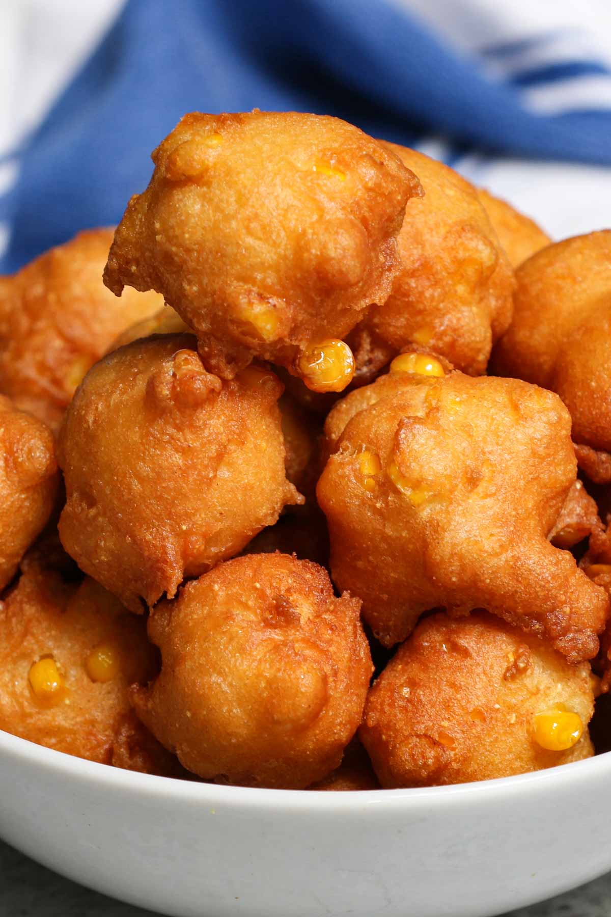 If you like corn fritters, you’ll love these Homemade Crispy Corn Nuggets. Make a quick batter by combining fresh or canned corn with a few kitchen staples, then fry them to golden perfection. This Southern fried corn nugget recipe is perfect for an appetizer, dessert, or side dish.