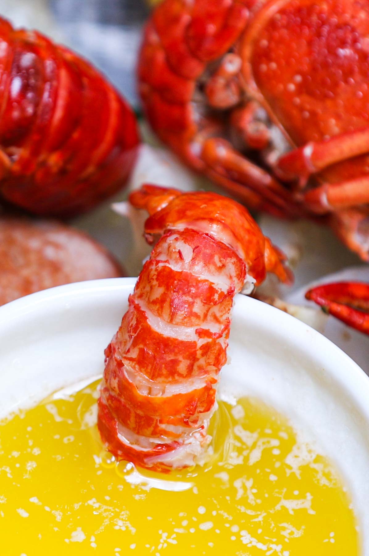 This Louisiana Crawfish Boil contains crawfish, corn, potatoes, and smoked sausage, all boiled in Old Bay seasoning flavored Cajun-style broth. Serve it with the classic seafood garlic butter sauce for the ultimate crawfish boil recipe.