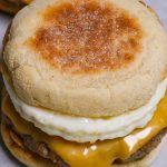 It’s the simple, yet satisfying breakfast sandwich you know and love! The Sausage Egg McMuffin features a fluffy English muffin, seasoned sausage, melted American cheese, and eggs done your way. There’s no need to head out to McDonald’s. This copycat recipe makes it so easy to recreate your own sausage McMuffin at home.