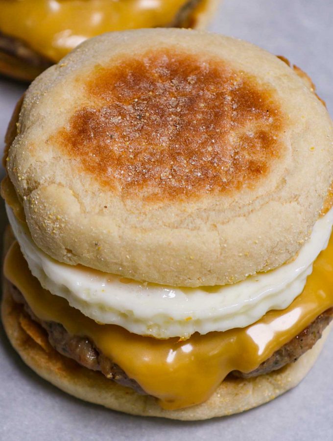 It’s the simple, yet satisfying breakfast sandwich you know and love! The Sausage Egg McMuffin features a fluffy English muffin, seasoned sausage, melted American cheese, and eggs done your way. There’s no need to head out to McDonald’s. This copycat recipe makes it so easy to recreate your own sausage McMuffin at home.