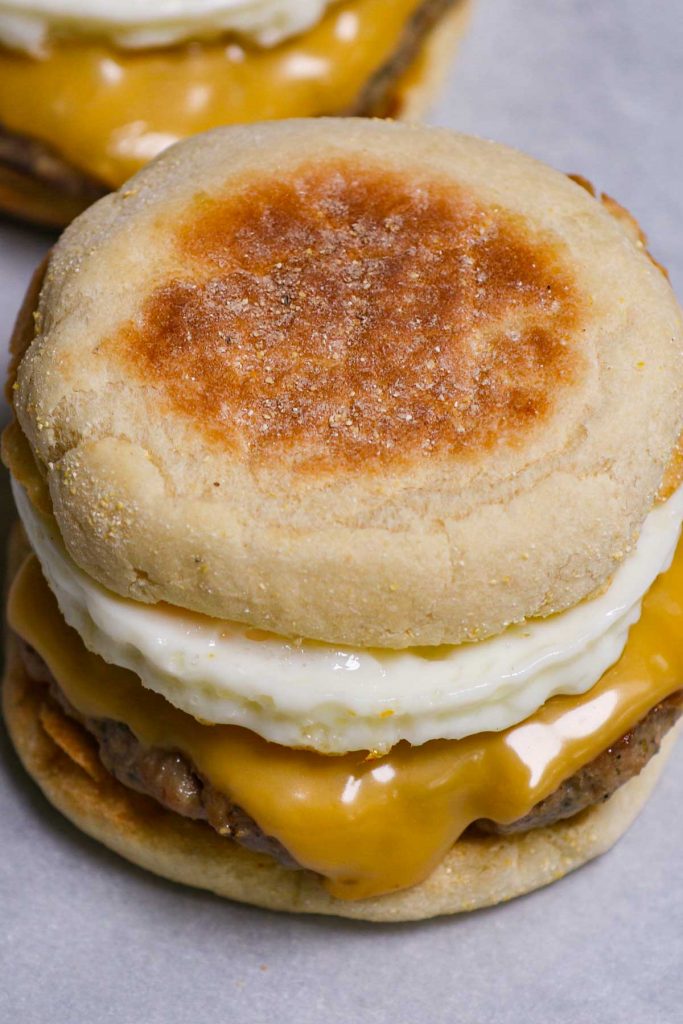 It’s the simple, yet satisfying breakfast sandwich you know and love! The Sausage Egg McMuffin features a fluffy English muffin, seasoned sausage, melted American cheese, and eggs done your way. There’s no need to head out to McDonald’s. This copycat recipe makes it so easy to recreate your own sausage McMuffin at home.