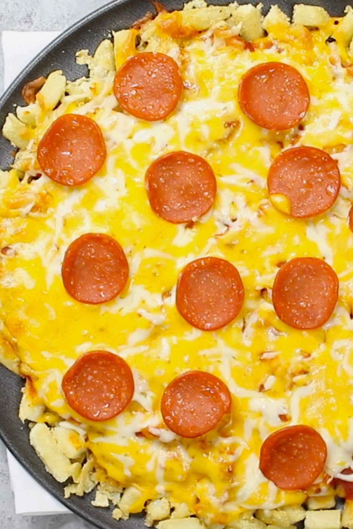 Pepperoni Pizza Fries are loaded with crispy French fry pizza crust and cheesy pepperoni toppings. This is a special pizza you’ve never had before! It’s so easy to make and you can use frozen, freshly cooked, or leftover French fries. Great for a game day party or any fun dinner parties.